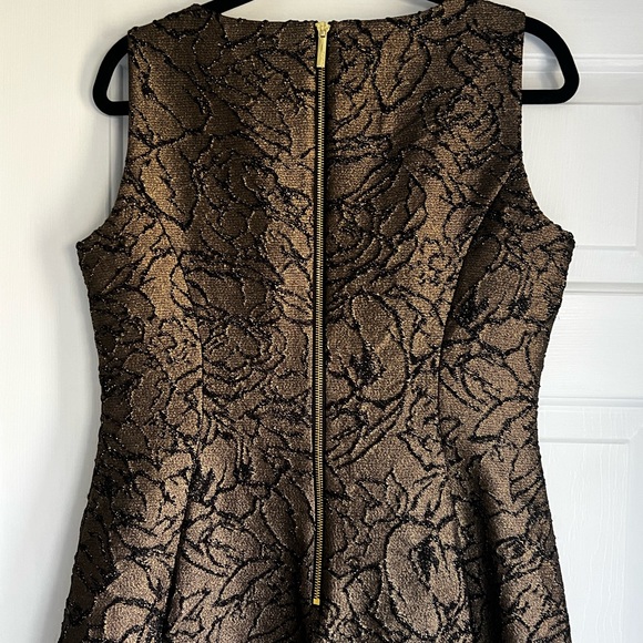 CALVIN KLEIN
Brocade Flounce-Hem Sheath Dress - Picture 7 of 10